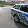 poškozené policejní vozidlo     foto:PČR